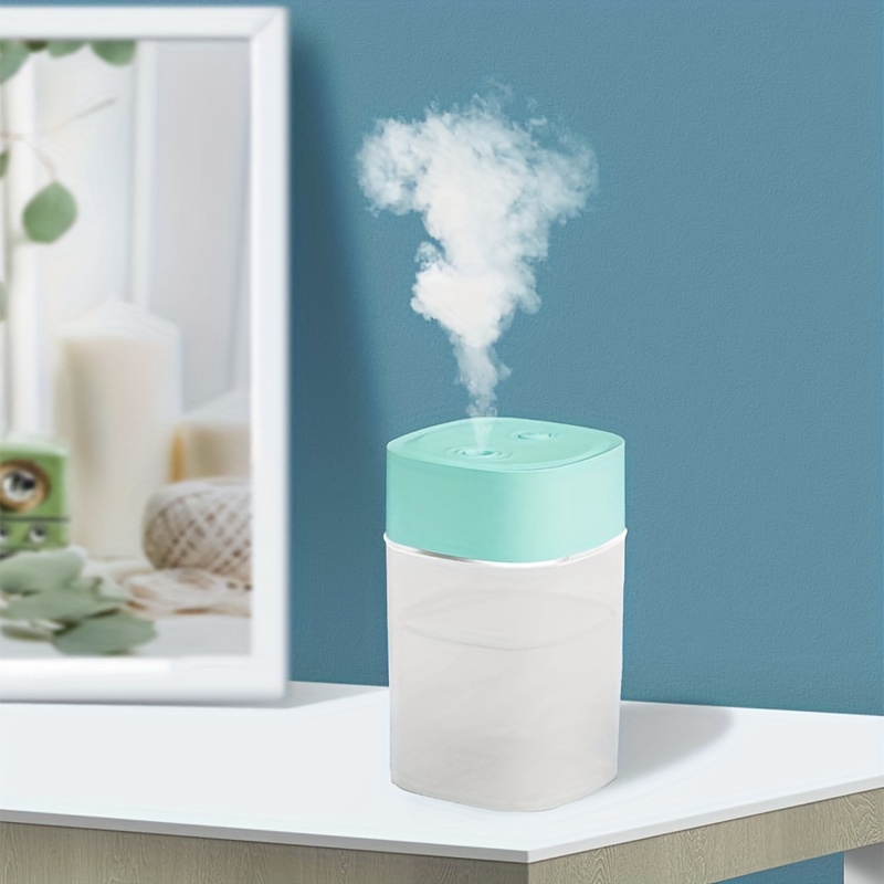 Portable mini humidifier with LED night light, USB-powered, 400 mL capacity — side view with LED light on