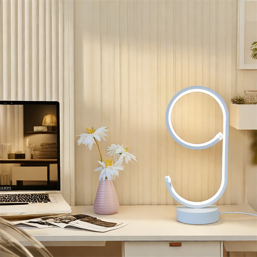Adjustable 3-color aluminum alloy LED desk lamp — top-down view on office desk
