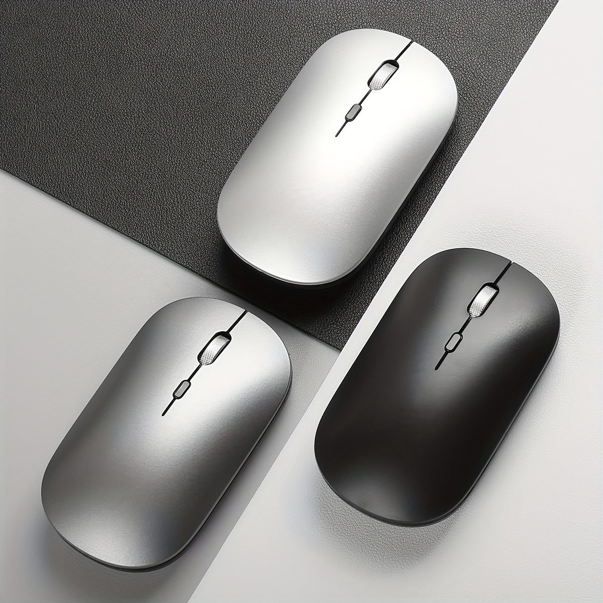 Wireless silent mouse — top-down view emphasizing symmetrical ambidextrous design