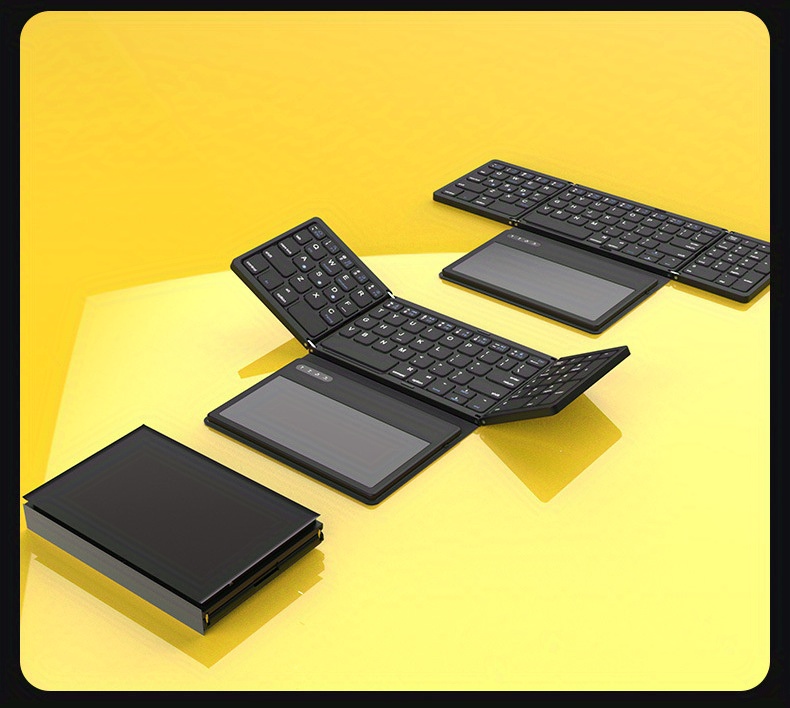 Folded keyboard shown alongside USB charging cable and charging port